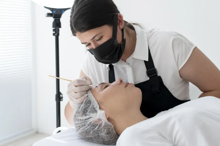 Violacea Beauty's professional eyelash extension service showcasing precision technique and premium beauty treatments